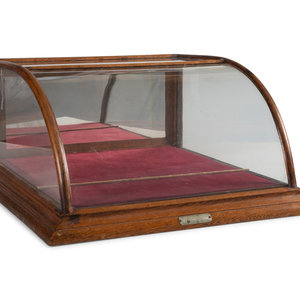 A Domed Oak Frame Display Case