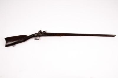 A double-barrel flintlock muzzle