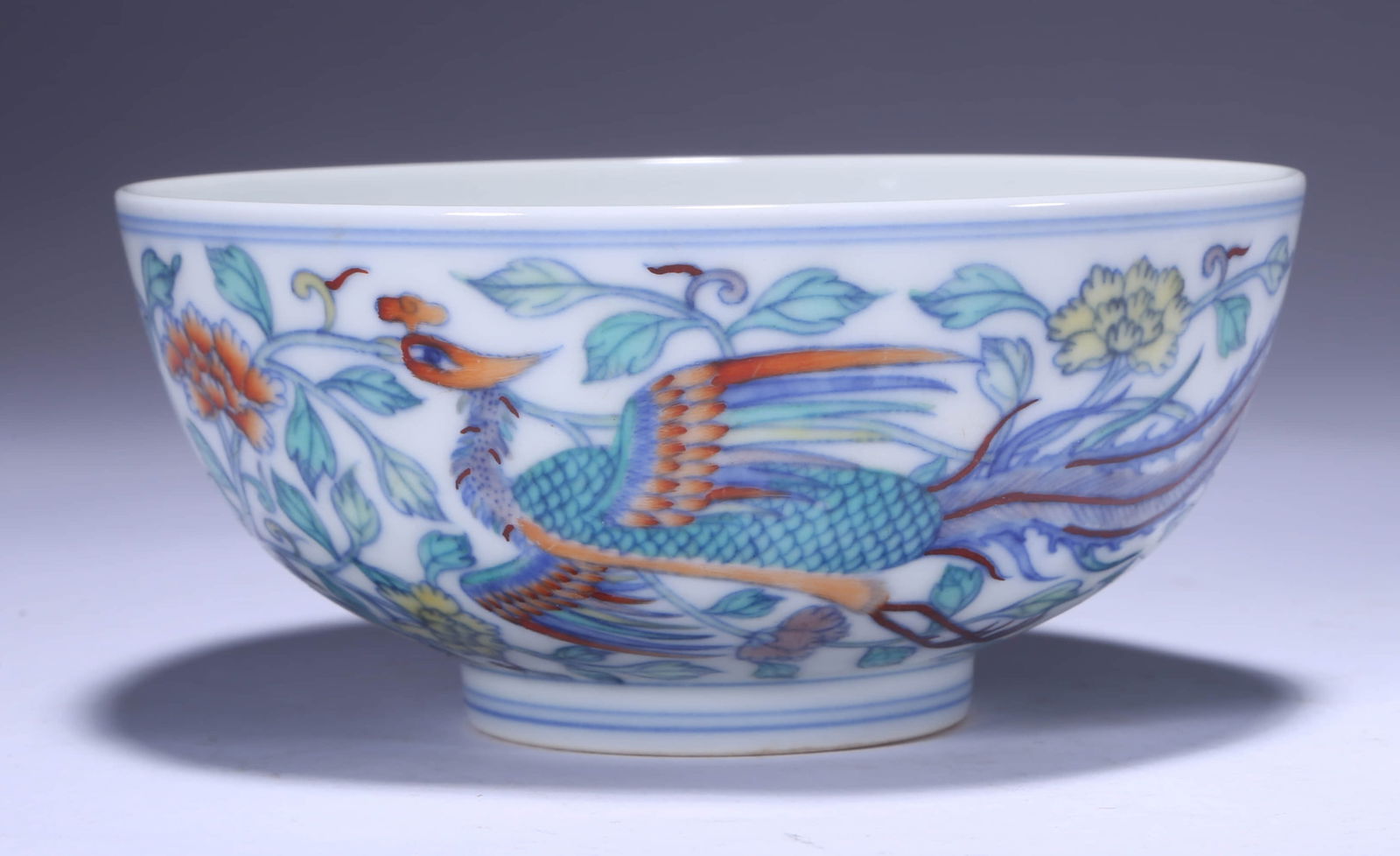 A DOUCAI 'FLORAL AND PHOENIX' BOWLA