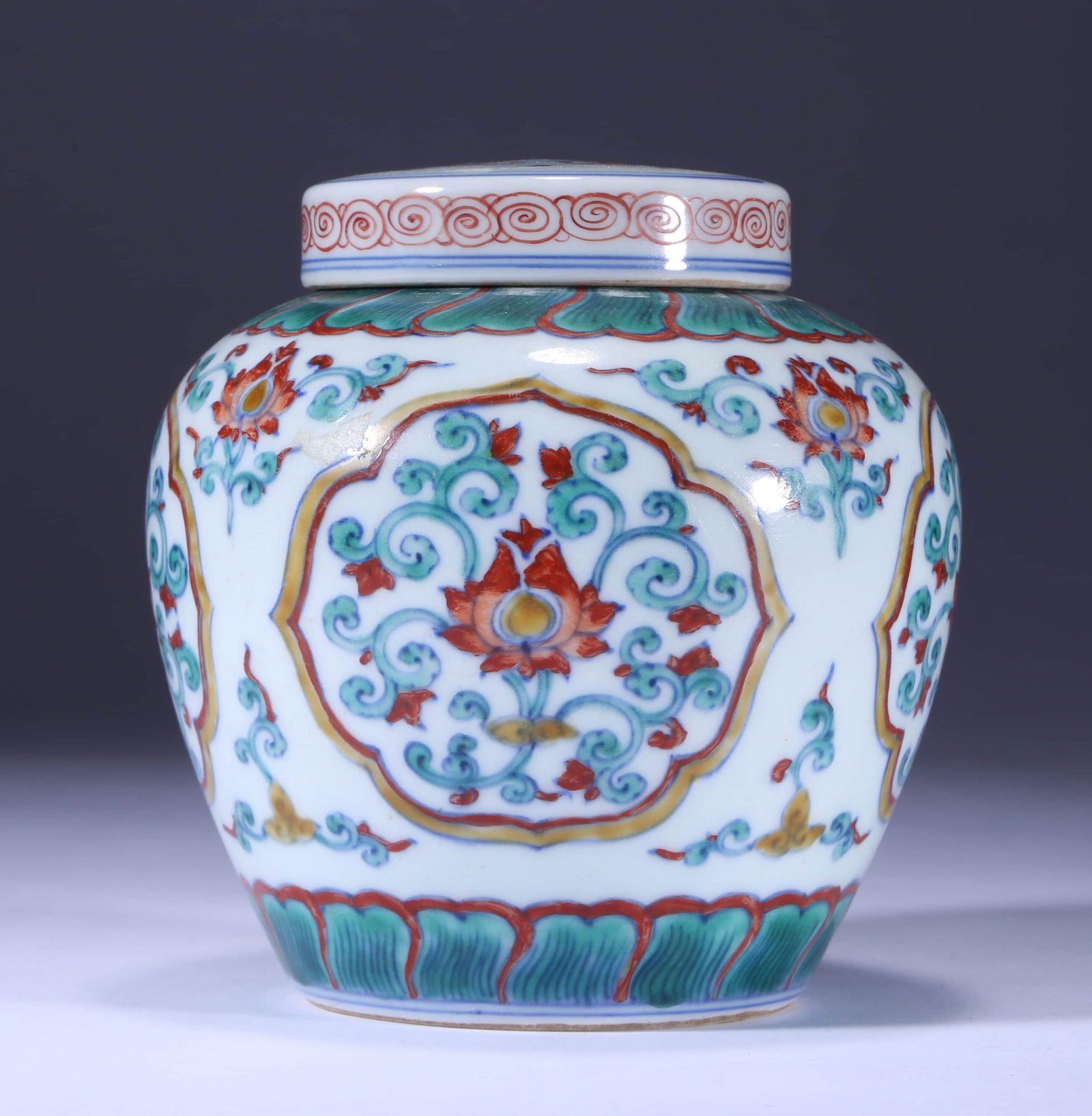 A DOUCAI 'FLORAL' COVERED JARA