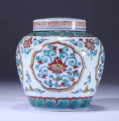 A DOUCAI 'FLORAL' COVERED JAR<