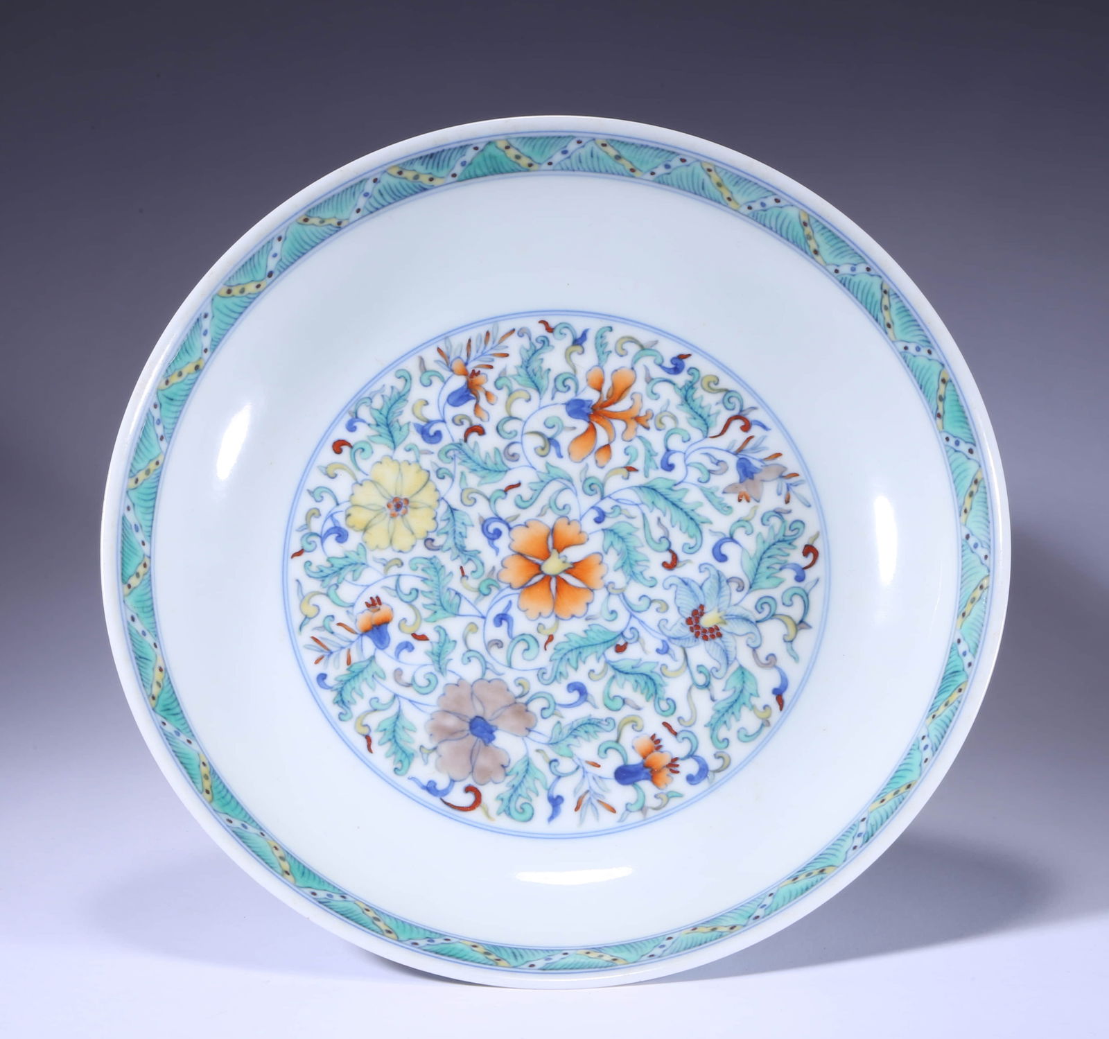 A DOUCAI 'FLORAL' DISHA DOUCAI