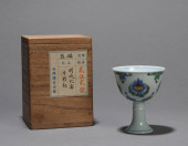 A DOUCAI 'FLORAL' STEM CUP<br>