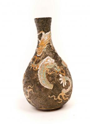 A Doulton dragon vase by Bessie