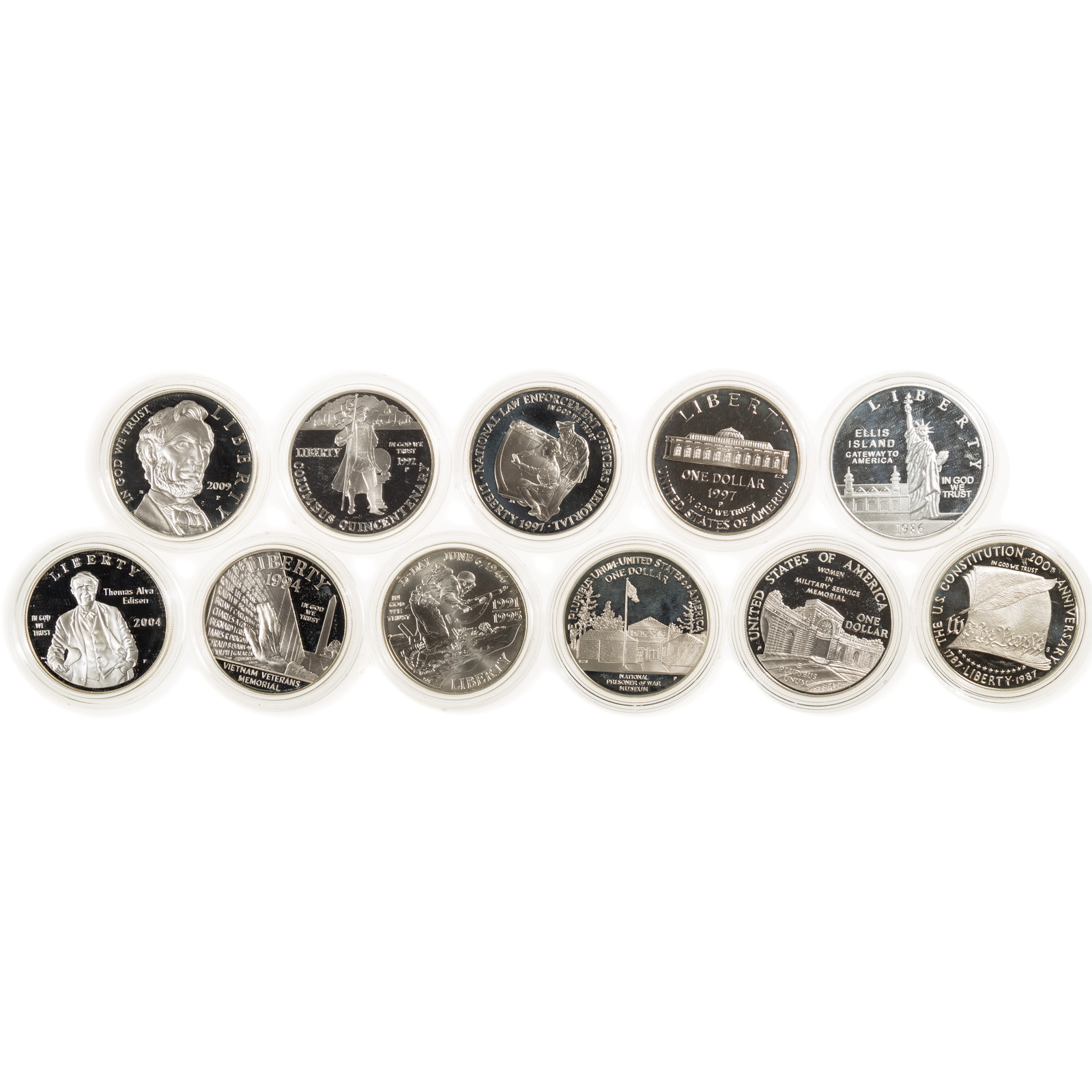 A DOZEN $1 SILVER COMMEMORATIVES IN
