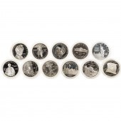 A DOZEN $1 SILVER COMMEMORATIV