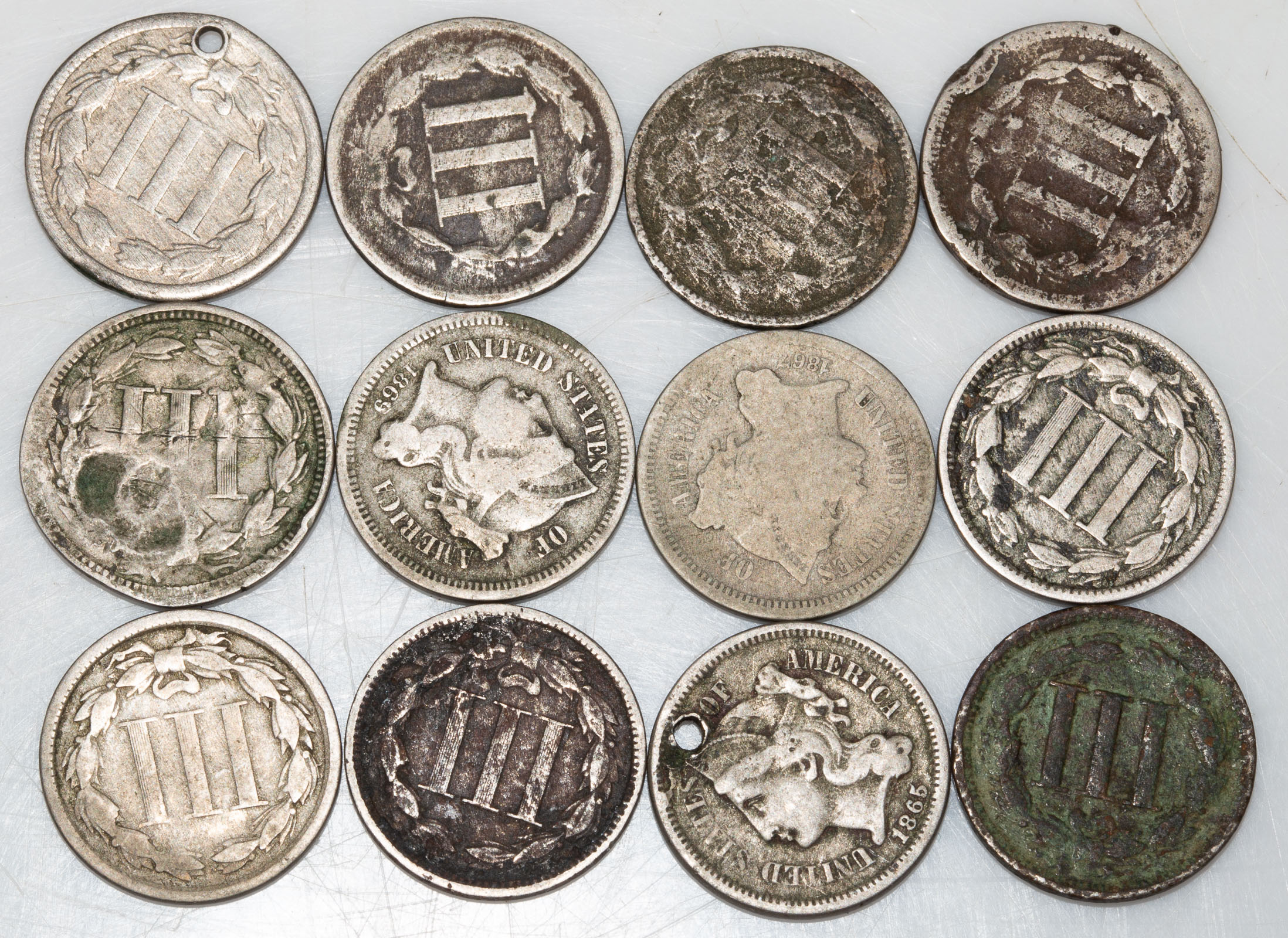 A DOZEN 3 CENT NICKELS, FOUR