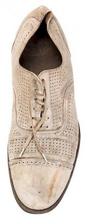 A DRESS SHOE OWNED AND WORN BY