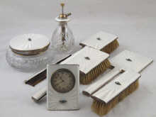 A dressing table set of eight