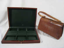 A Dunhill leather jewellery case in