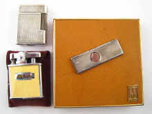 A Dunhill pig skin cigarette case
