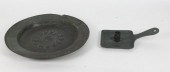 A Dutch brass alms dish with s