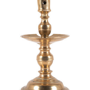 A Dutch Brass Heemskerk Candlestick