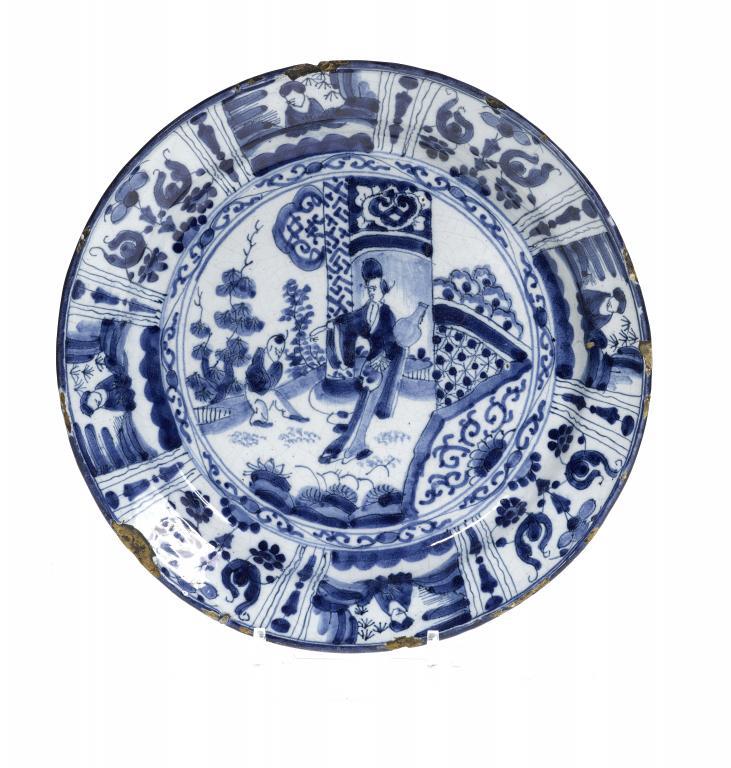 A DUTCH DELFTWARE DISH painted in