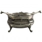 A DUTCH SILVER FOOTED TUREEN,