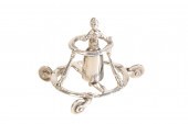 A DUTCH SILVER MINIATURE BABY