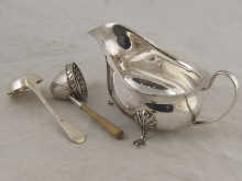 A Dutch silver tea strainer with