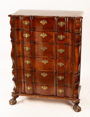 A Dutch walnut chest of six
