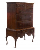 A DUTCH WALNUT CHEST ON STAND