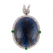 A FACETED SAPPHIRE SLICE & DIA