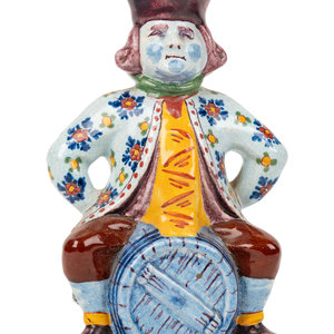 A Faïence "Man on a Barrel"