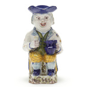 A FAIENCE TOBY JUG<br>A Faienc