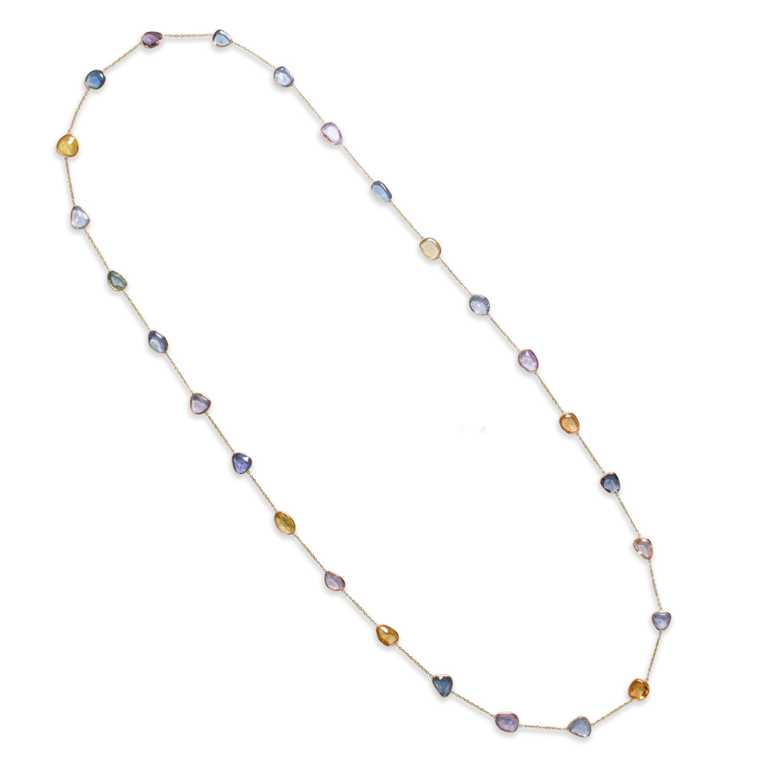 A FANCY COLORED SAPPHIRE AND