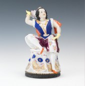 A Fancy Costume Figural Tobacc