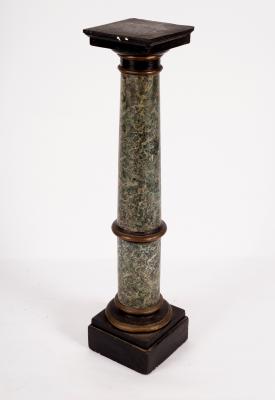 A faux marble plinth of tapered