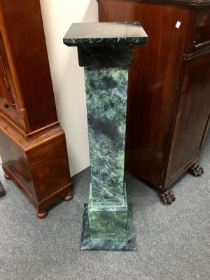 A faux marble plinth, square with