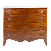 A FEDERAL MAHOGANY BOW FRONT C