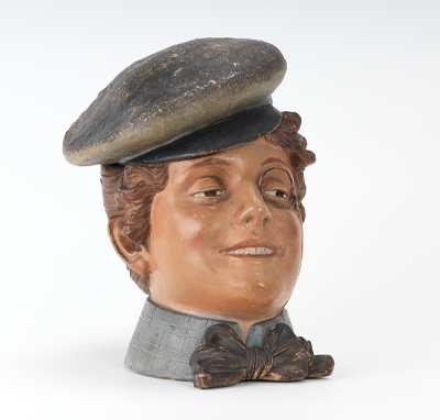 A Female Head Tobacco Jar of Capped