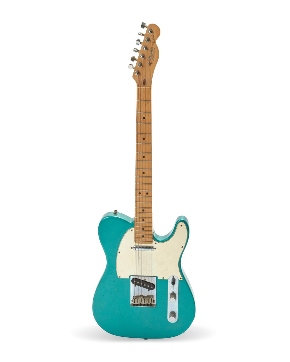A FENDER TELECASTER ELECTRIC