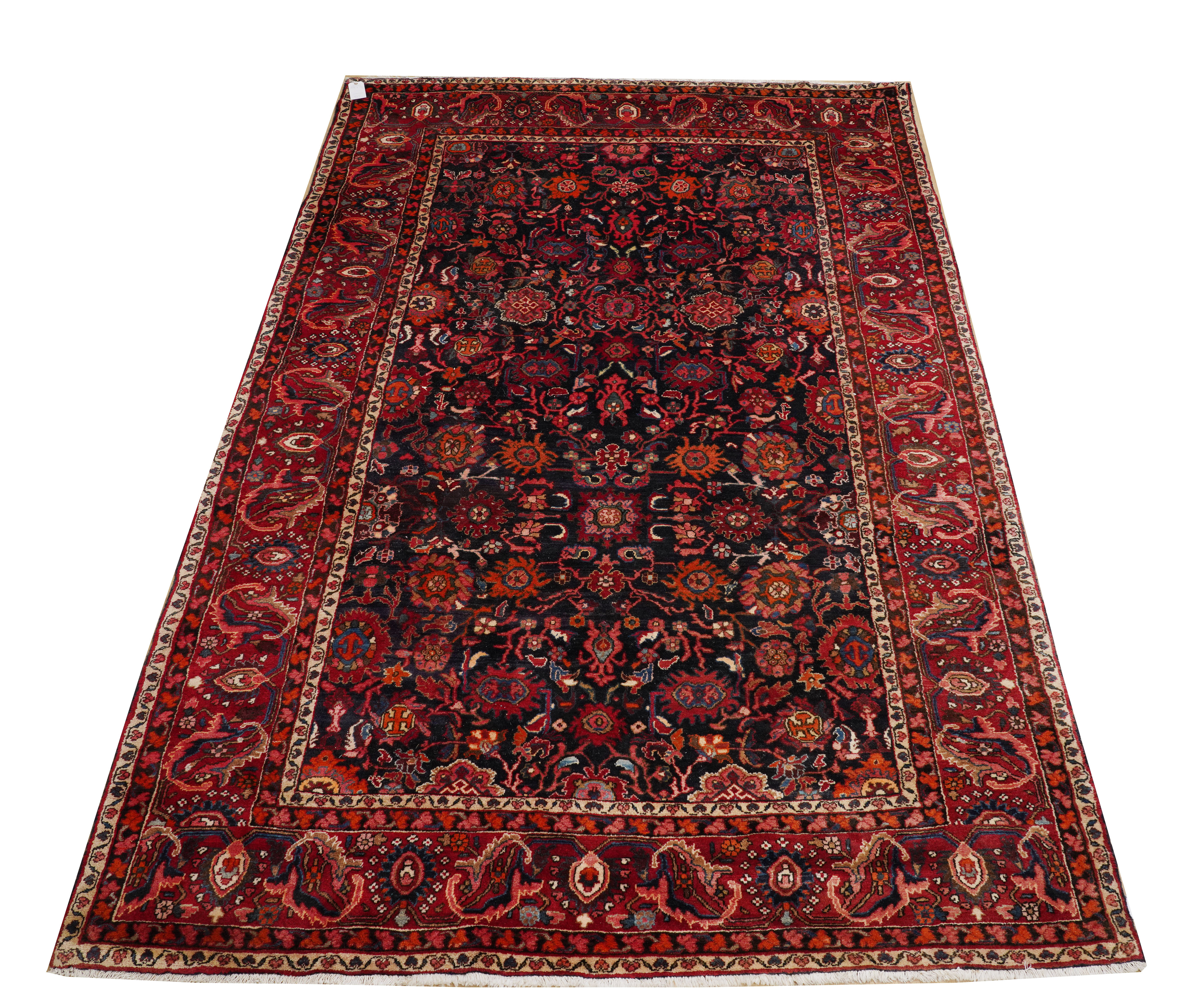A FERAGHAN CARPET, PERSIAN The dark