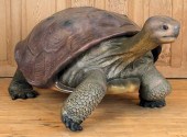 A FIBERGLASS FIGURE OF A TORTO