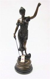 A FIGURAL BRONZE SCULPTURE ''B