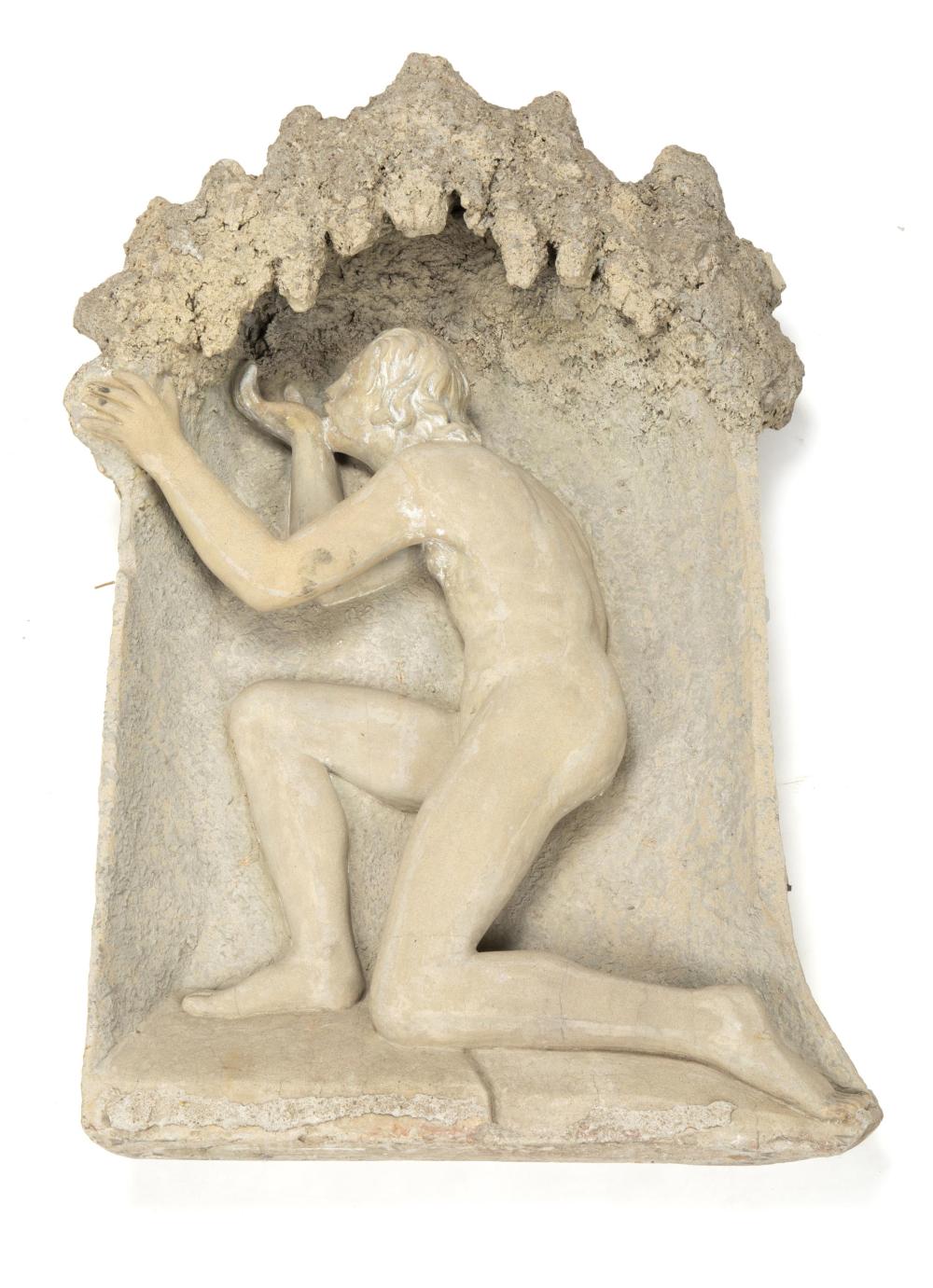 A FIGURAL CAST STONE