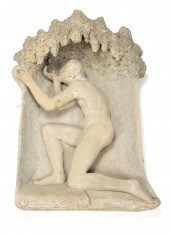 A FIGURAL CAST STONE ARCHITECT
