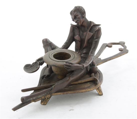 * A Figural Chamberstick