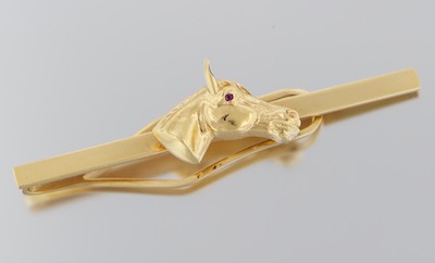A Figural Gold Horse Head Money