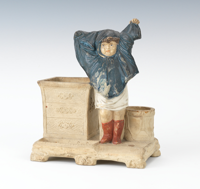 A Figural Match-Strike of a Child