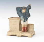 A Figural Match-Strike of a Ch