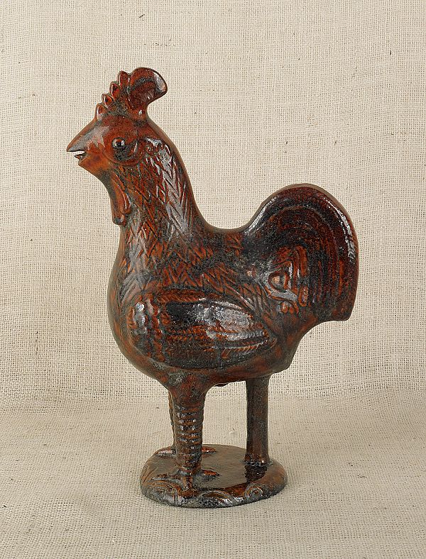 A figural redware rooster 20th c.