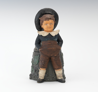 A Figural Tobacco Jar of a Youth