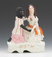 A Figural "Topsy & Eva" Each m