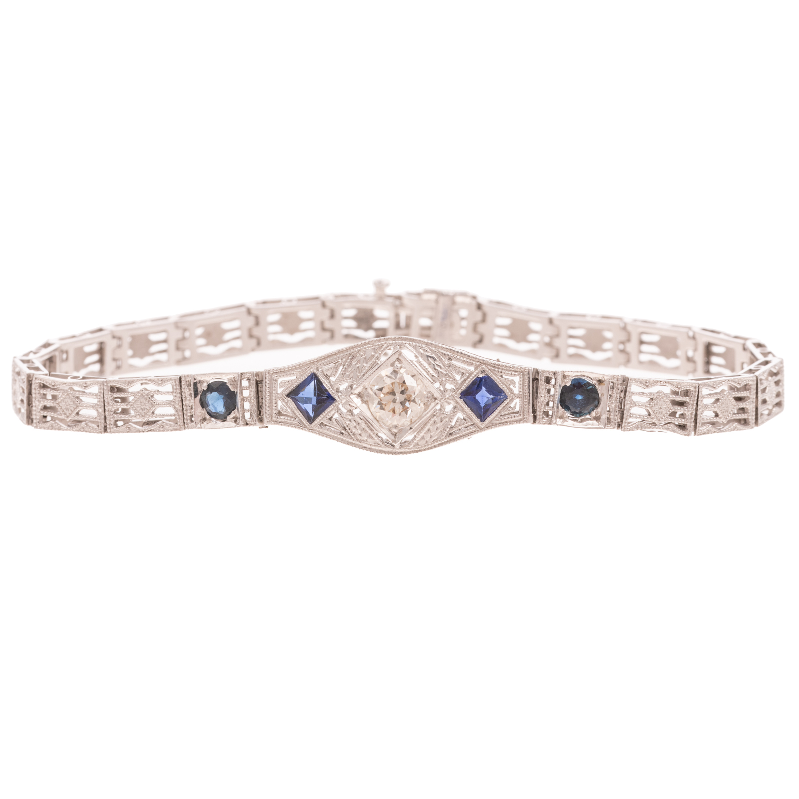 A FILIGREE DIAMOND & SAPPHIRE