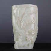 A FINE CARVED JADE BRUSHPOT<br