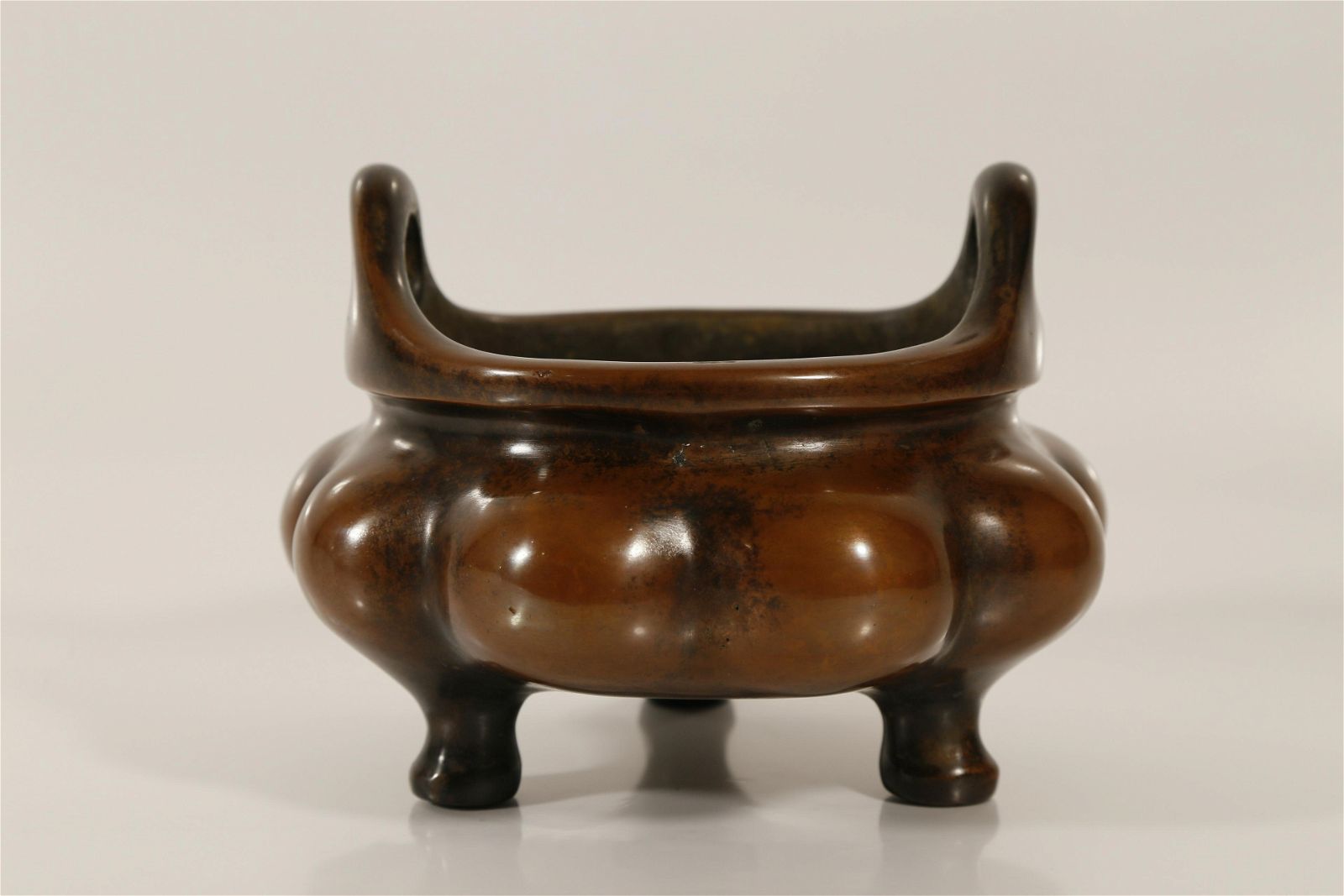 A FINE COPPER 'PUMPKIN' HANDLE
