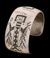 A FINE DEEPLY CARVED STERLING