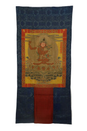 A FINE EMBROIDERED THANGKA OF